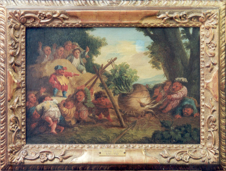 Nani che sradicano un ortaggio prima del restauro